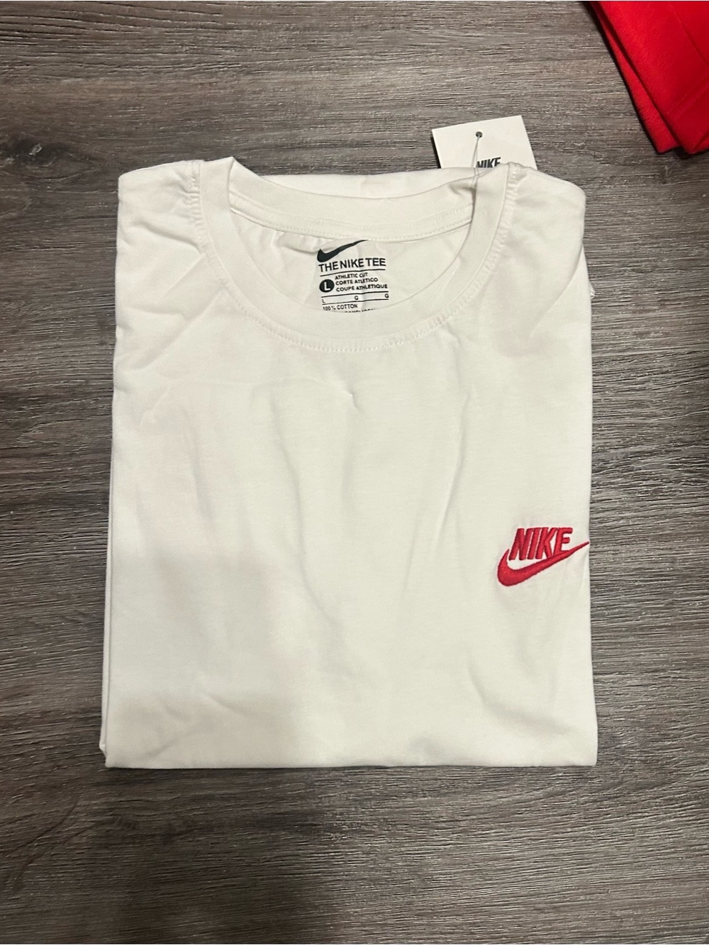 Nike White T-Shirt with Red Swoosh Logo
